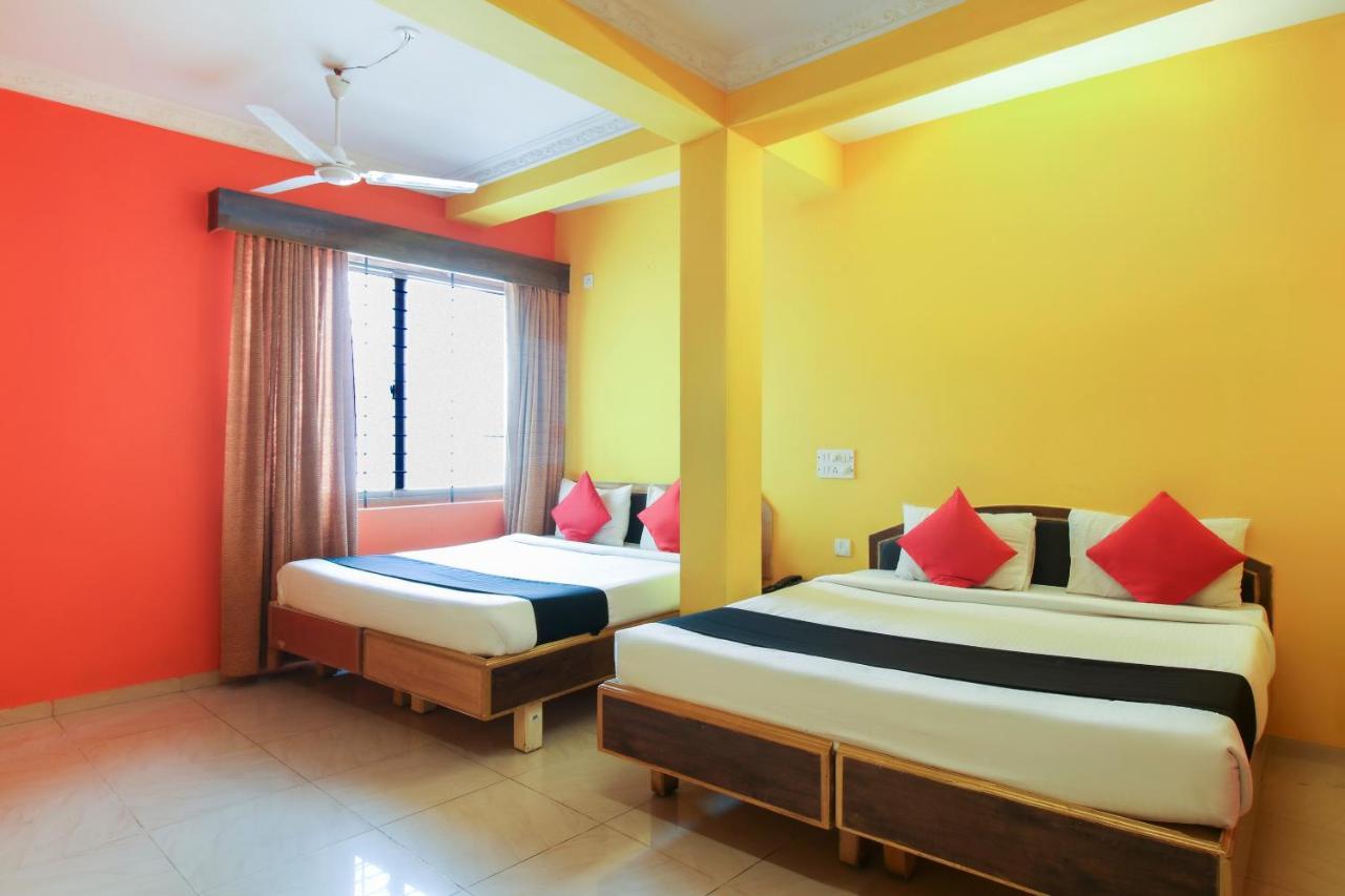 Capital O 71729 Lucky Inn Bangalore Buitenkant foto